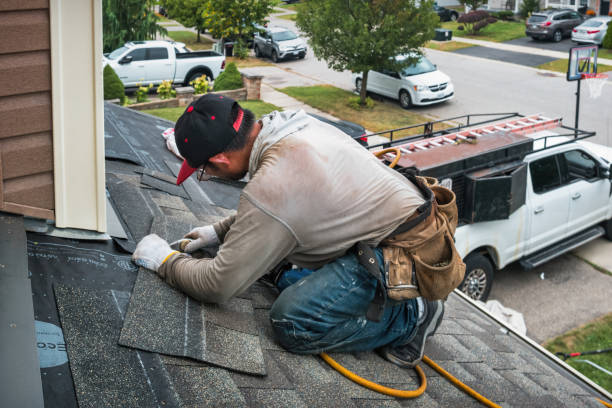 Professional Emergency Roof Repair technician working in Freehold, NJ
